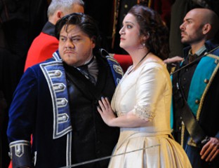 Diego Torre as Gabriele Adorno, Natalie Aroyan as Amelia Grimaldi and the Opera Australia Chorus in Opera Australia’s production of Simon Boccanegra as Sydney Opera House. Photo by Branco Gaica.