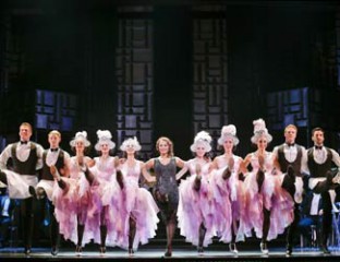 Danielle de Niese as Hanna Glawari (center) in Opera Australia's production of The Merry Widow at the Arts Centre Melbourne. Photo credit Jeff Busby.