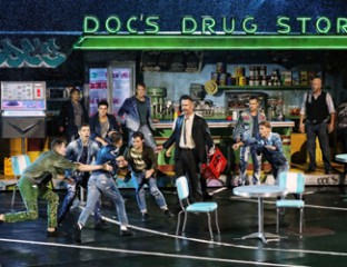 Scott Irwin as LT. Schrank, David Whitney as Doc and Jets in Opera Australia's 2019 Handa Opera on Sydney Harbour — West Side Story. Photo credit: Prudence Upton